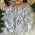 baltos spalvos ranku darbo eglutes kaspinai