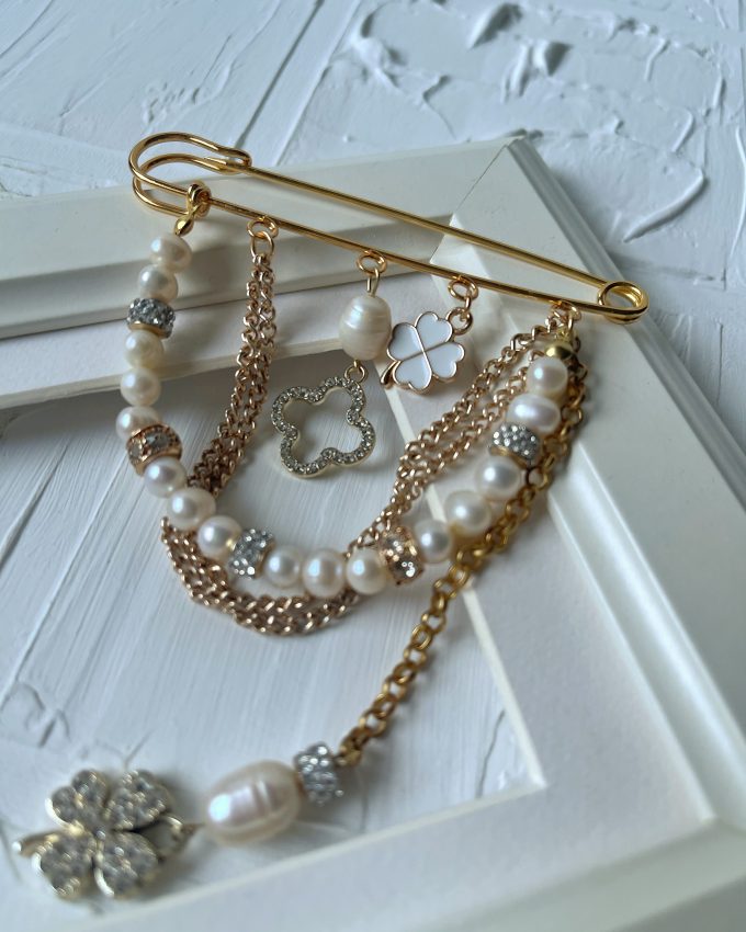 perlų sagė, auksinė sagė, balta sagė