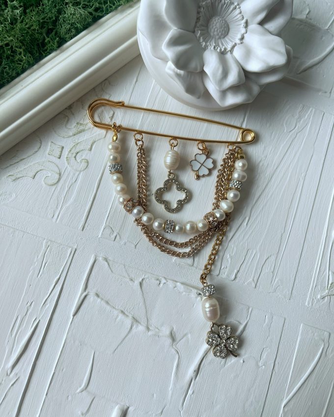 perlų sagė, auksinė sagė, balta sagė