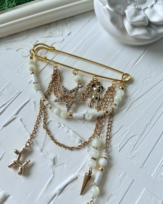 perlų sagė, auksinė sagė, balta sagė